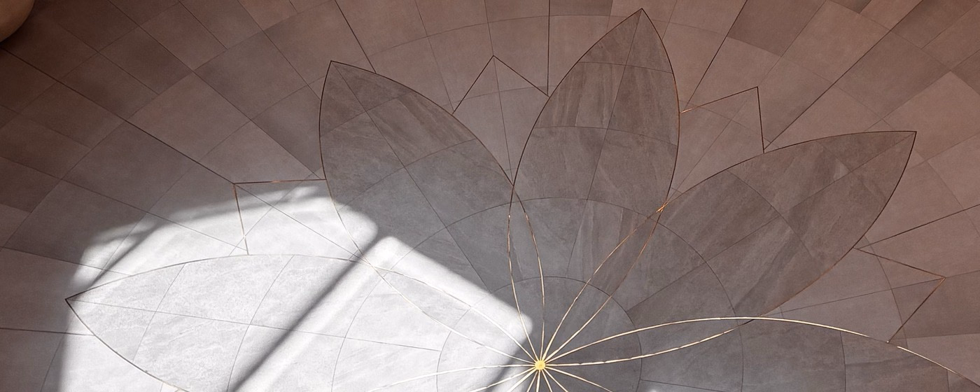 Sunlight falling through a window onto a tiled floor